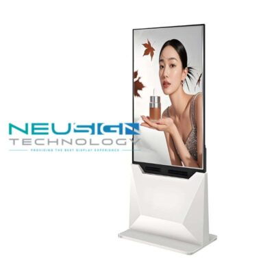 A razor-thin, see-through OLED screen suspended in a glass storefront showing vibrant digital advertisements on both sides.